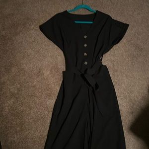 New without tag. Black jumpsuit. Cropped wide leg.never worn.